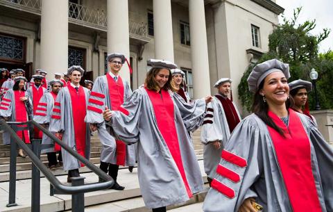 Doctoral candidates exit the building and proceed to Killian Court for the ceremony; photo: Jake Belcher