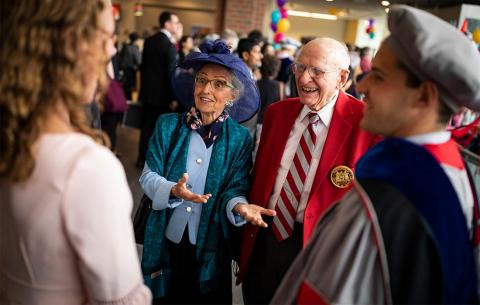 Guests congratulate graduates