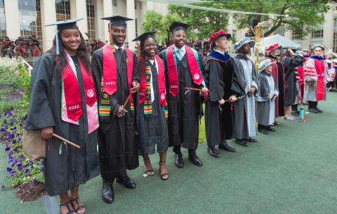 Image of graduates on the stage at the Special Ceremony for the Classes of 2020 and 2021