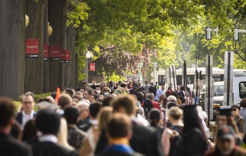 Image of Commencement guests walking towards Killian Court