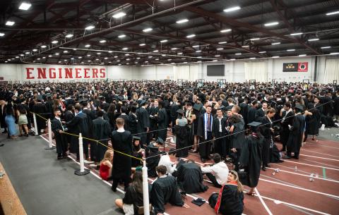 Image of graduates assembling for the procession into Killian Court