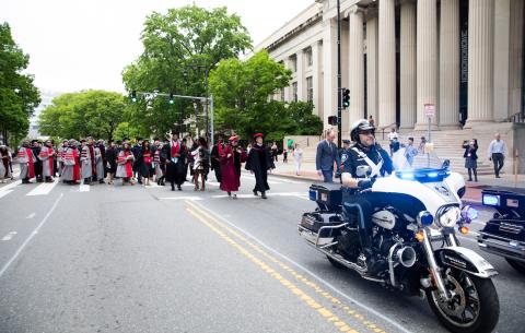 Image of graduates processing to Killian Court 