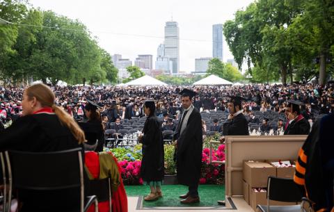 Image of graduates lined up on stage at the Special Ceremony for the Classes of 2020 and 2021