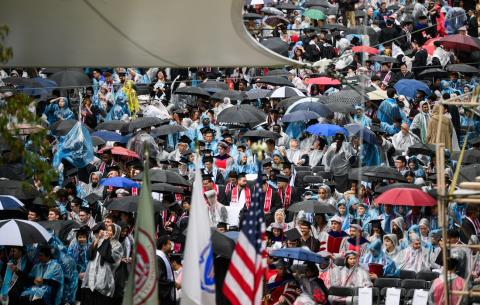 Image of the OneMIT Commencement Ceremony crowd in the rain