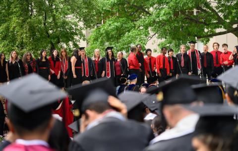 Image of the Chorallaries of MIT singing in unison